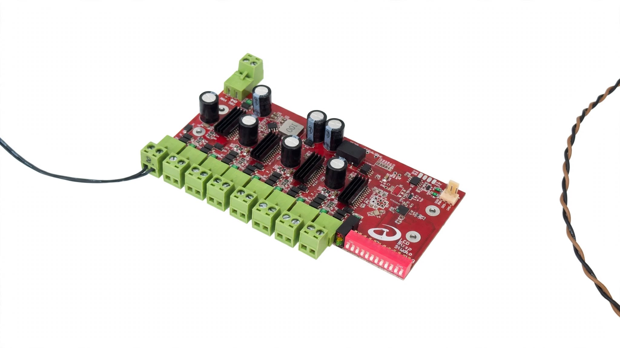 Bare Xmas Dimmer board with eight green screw-terminal outputs in a row