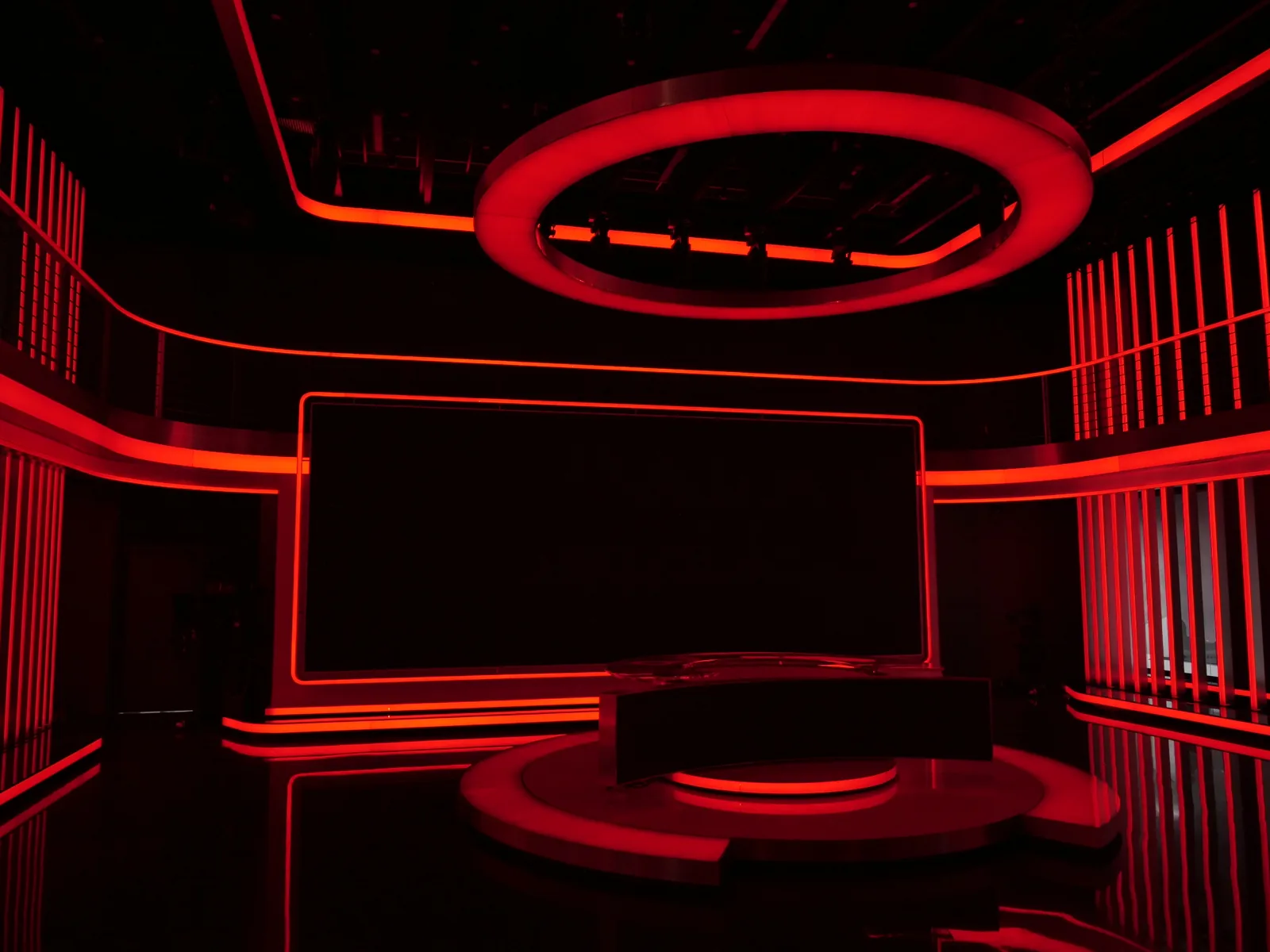 Pixel LED strips behind black plexiglass segments in the two-level CNN Prima NEWS set
