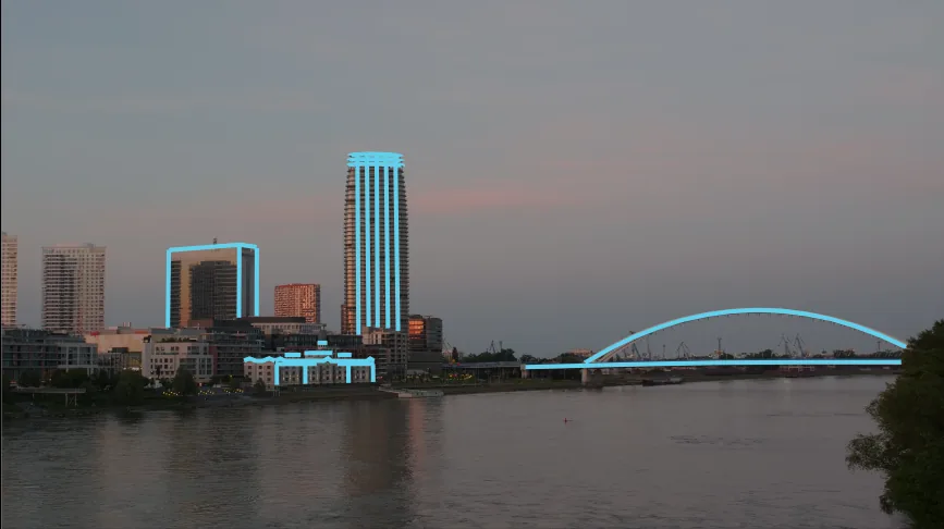 LED mapping overlaid on a real photo of a Bratislava building and bridge