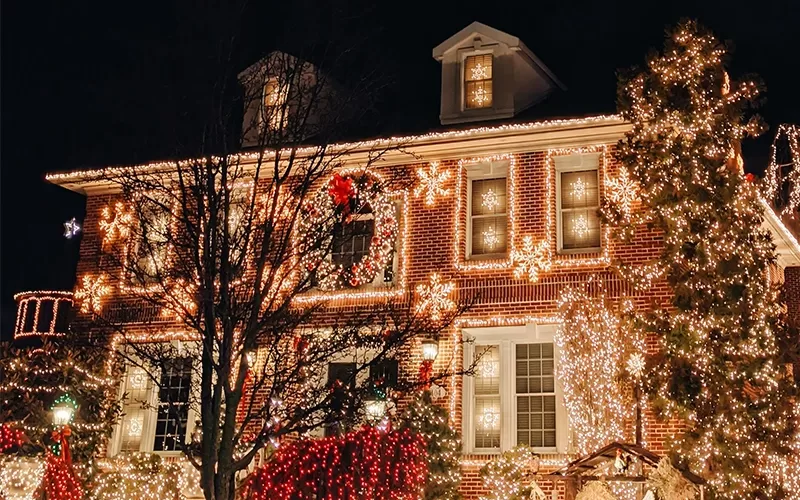 House facade decorated with Christmas lights