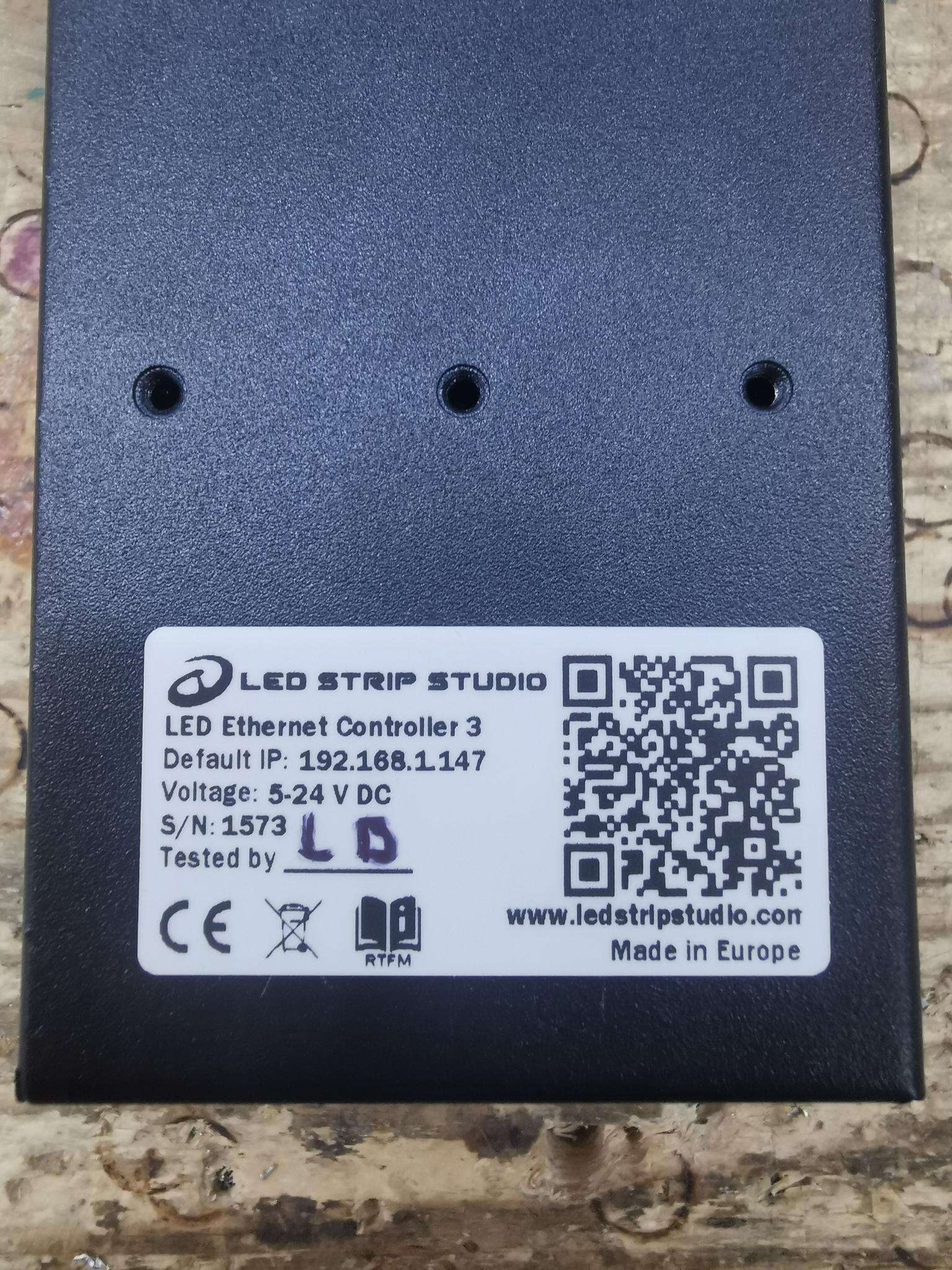 Back panel of a metal box of SPI Matrix. Small sticker with serial number can be located here.