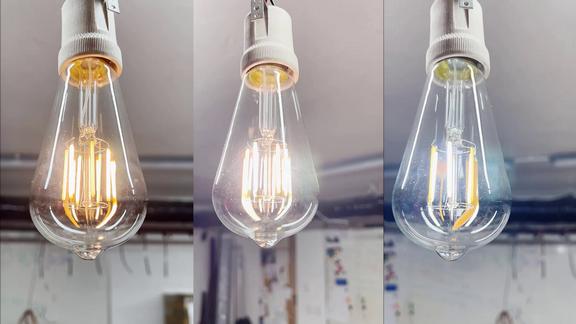 A single retro LED bulb showing Warm white, Cold white diodes on separately and all turned on on max. brightness.